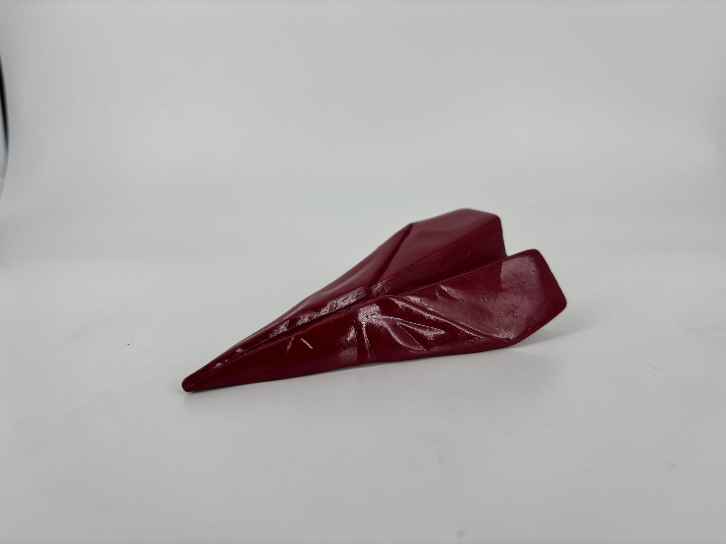 Razzetto Popikò in ceramica artigianale rossa lucida, fatto a mano in Italia con design contemporaneo elegante.